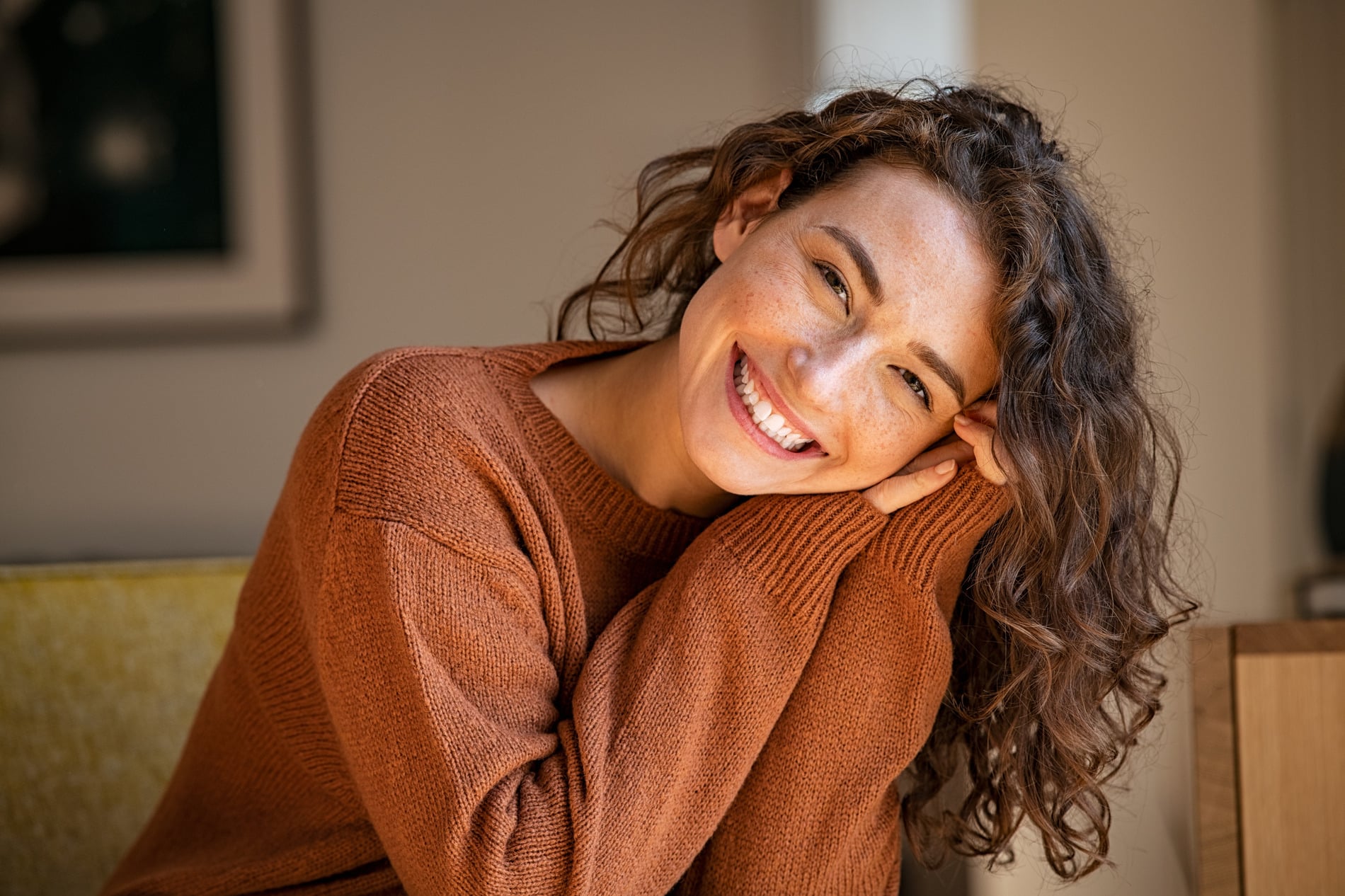 AdobeStock_457504159 v2 Woman showing off her smile after emegencry dentistry in Lindenhurst IL