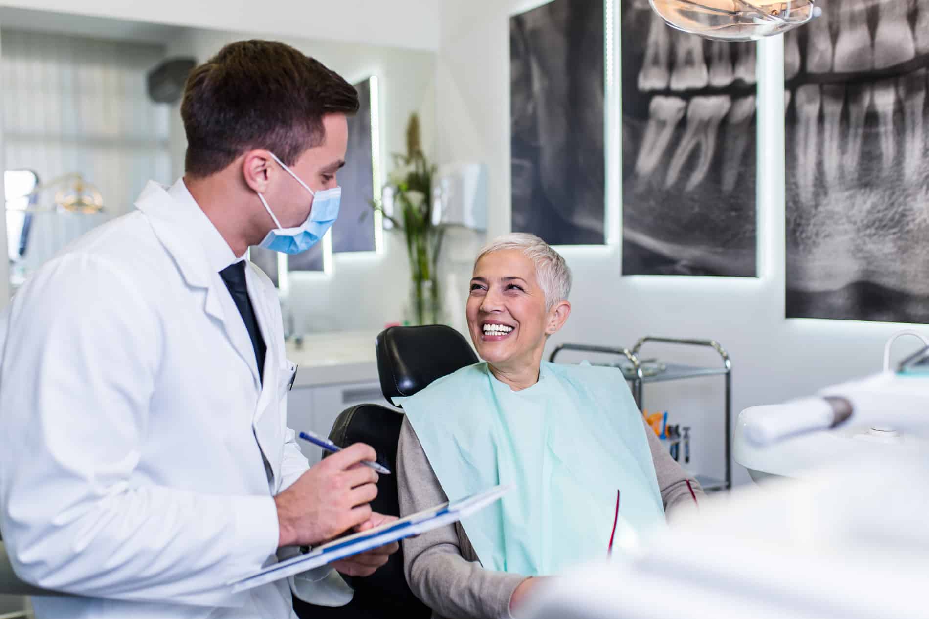 Woman at her consultation for dental implant restorations in Lindenhurst