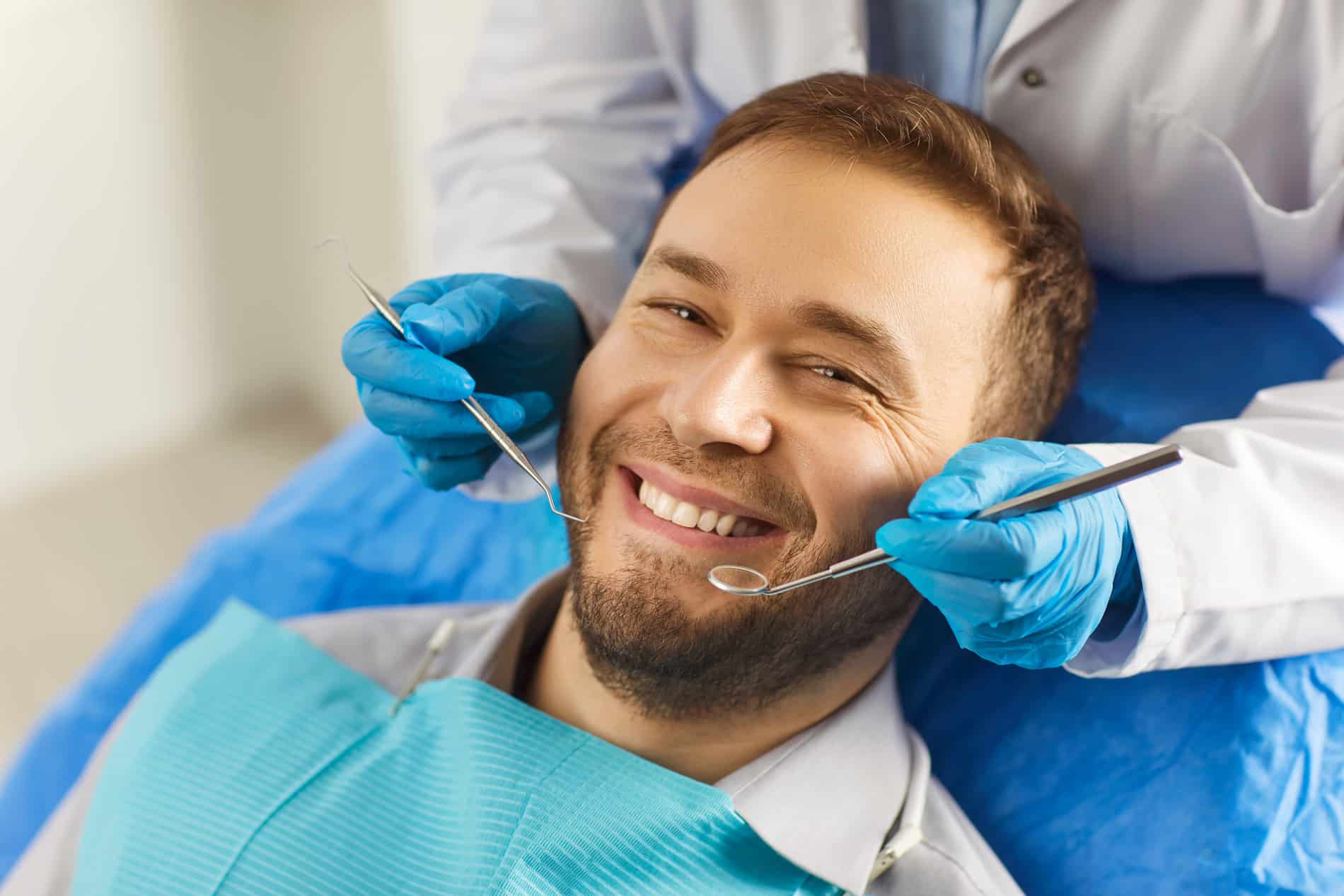 Man at his oral examination with Dr. Chung