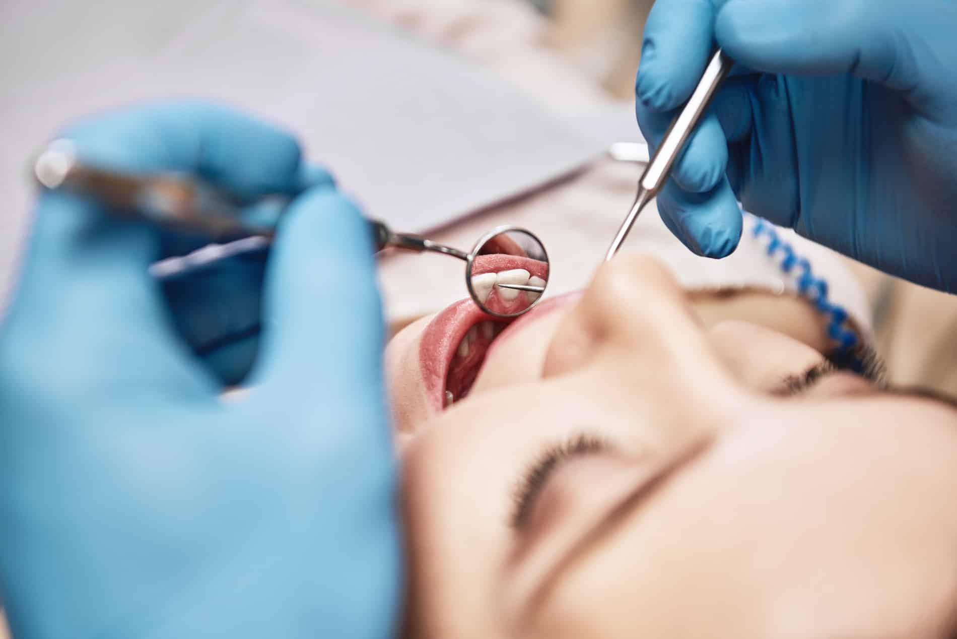 Woman getting a complete oral exam at Clarity Dental Group in Lindenhurst IL