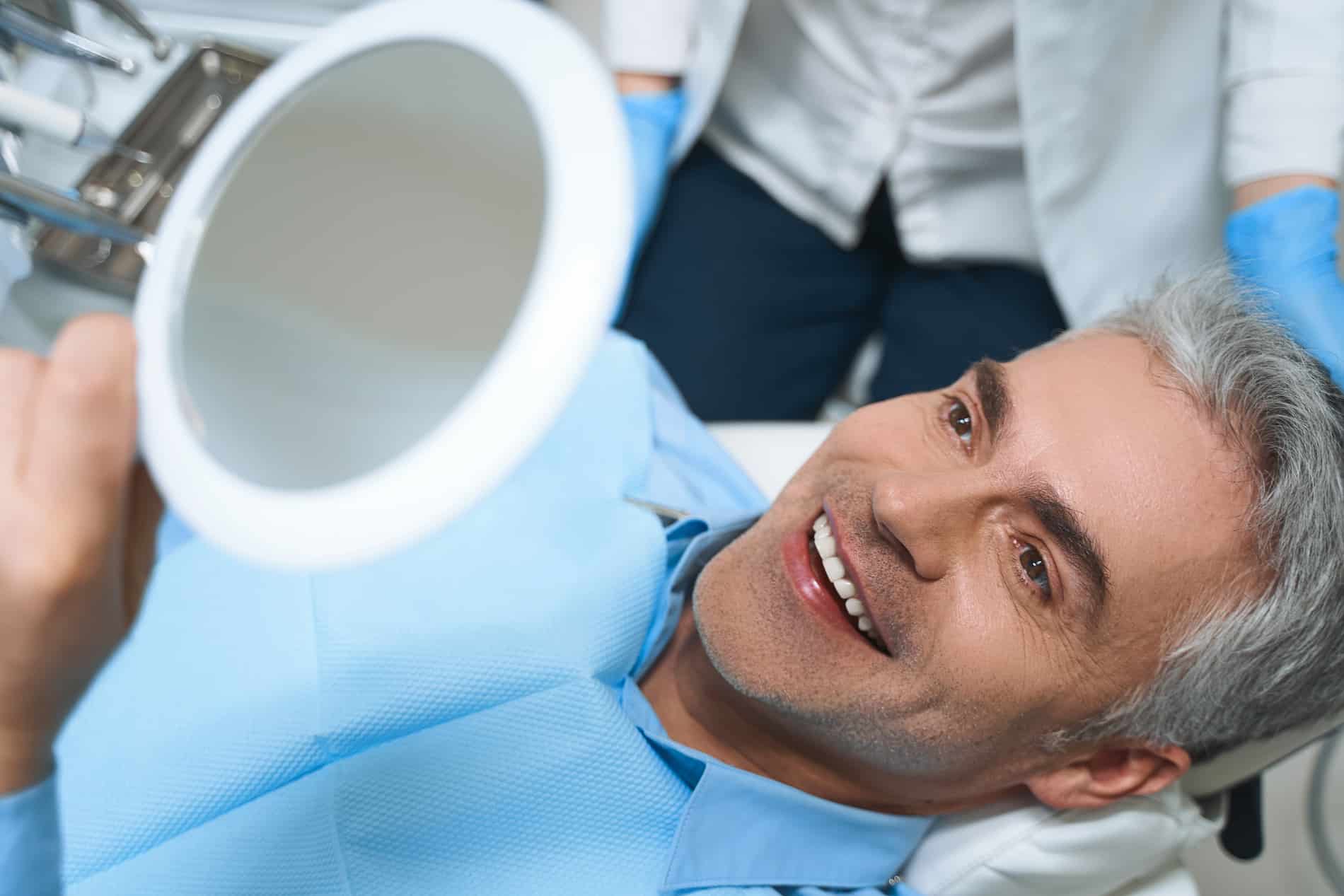Man at his porcelain veneers appointment at Clarity Dental Group
