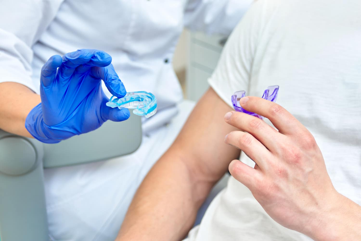 Dr. Chung gives patient a custom sports guard in Lindenhurst IL